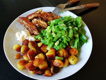 Close-up of salad in plate on table