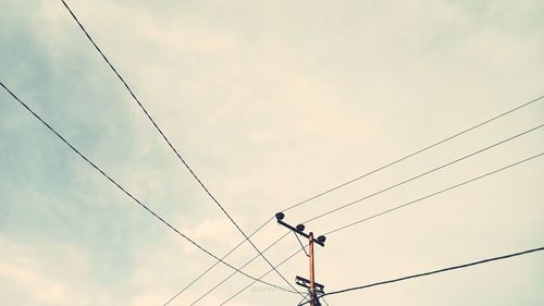 Sky, clouds, and cables.
