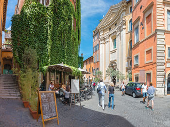 People on street in city