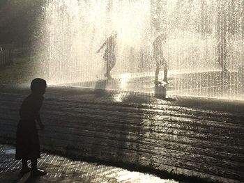 Reflection of woman in water