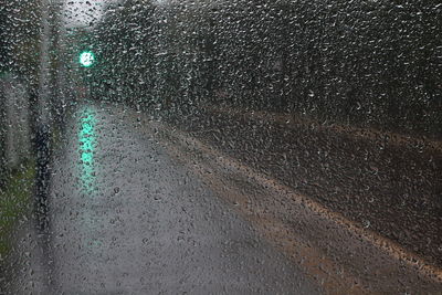 Wet road in city during rainy season