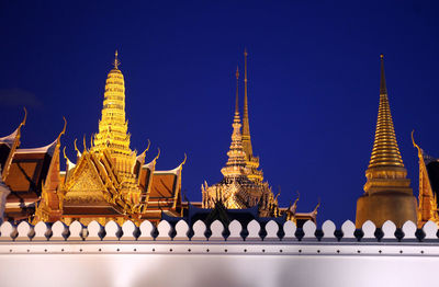 Low angle view of temple against blue sky