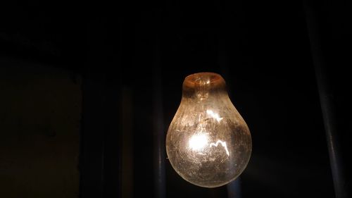 Close-up of illuminated light bulb