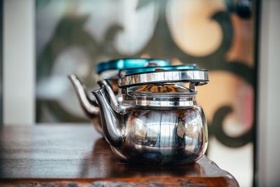 Close-up of glass jar on table at home