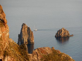 High angle view of rock formation in sea