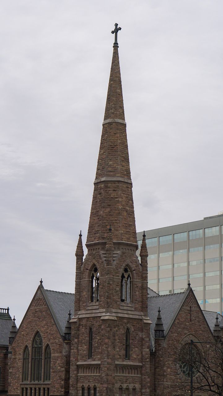 LOW ANGLE VIEW OF CHURCH AGAINST BUILDING