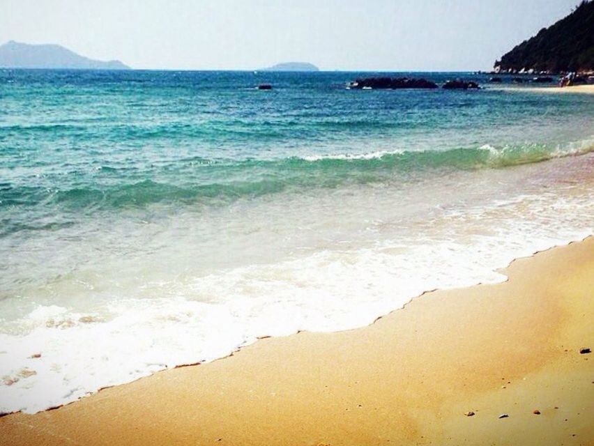 sea, water, beach, horizon over water, shore, wave, sand, surf, scenics, beauty in nature, tranquil scene, tranquility, nature, coastline, idyllic, blue, clear sky, seascape, sky, tide