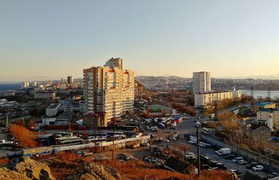 High angle view of buildings against clear sky