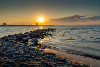 Scenic view of sea against sky during sunset