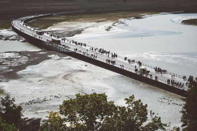 High angle view of people by river during winter