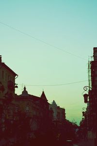 Low angle view of buildings against clear sky
