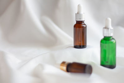 High angle view of bottles on table