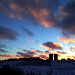 Scenic view of landscape against cloudy sky