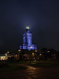 Illuminated buildings in city at night