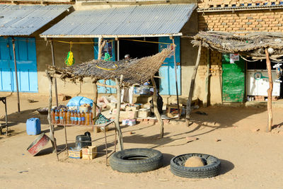 Panoramic view of beach huts against buildings