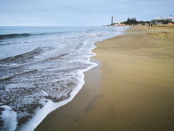 Scenic view of beach against sky