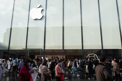 Group of people in front of building