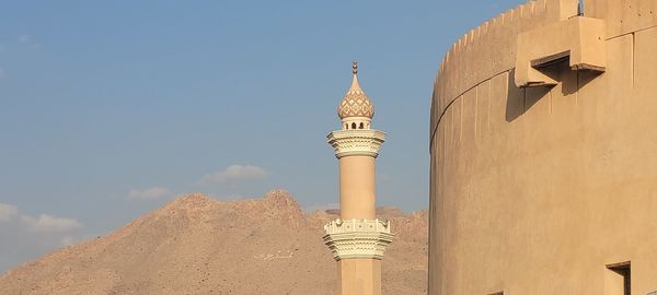 Low angle view of lighthouse against clear sky