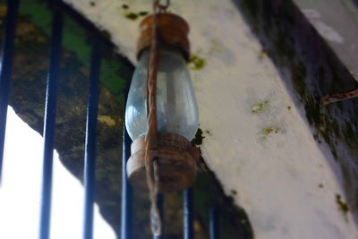 High angle view of rusty metal on wood