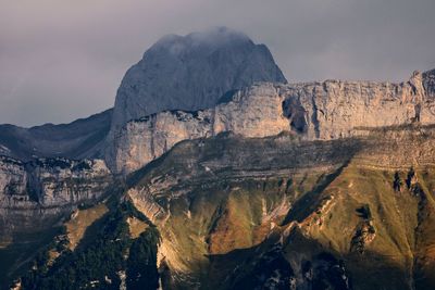 Panoramic view of rocky mountains against sky