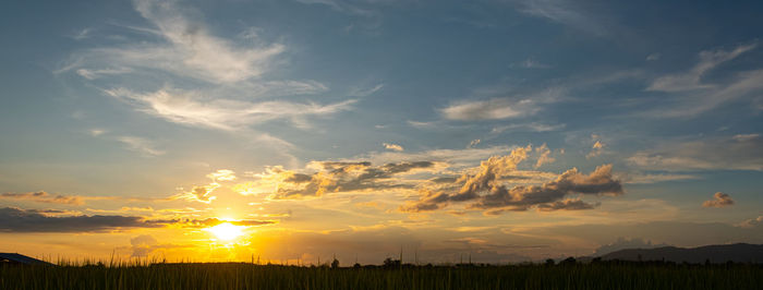 Scenic view of silhouette landscape against sky during sunset