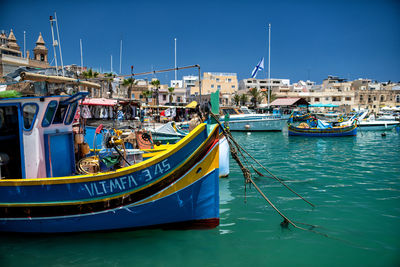 Boats moored in harbor