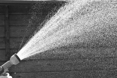 Sprinkler spraying water in garden