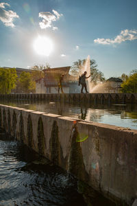 Panoramic view of canal against sky