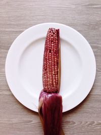Directly above shot of corn in plate on table