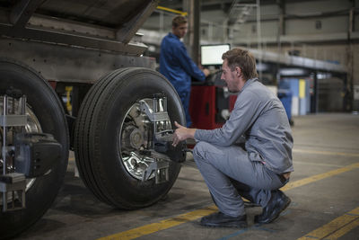 Factory worker in truck manufacture