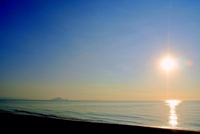 Scenic view of sea at sunset