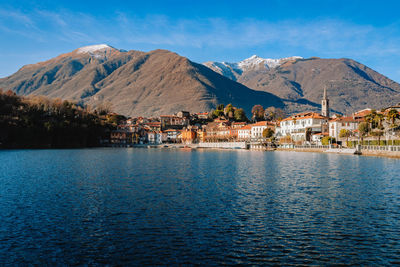 Scenic view of lake and mountains against sky