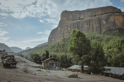 View of mountain road against cloudy sky