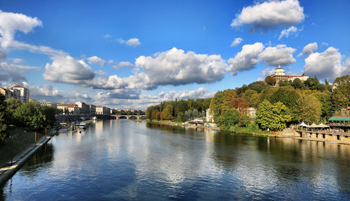 View of town against cloudy sky