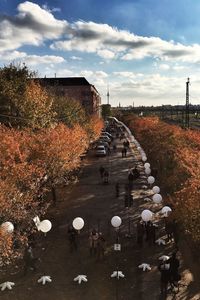 Surface level of road against cloudy sky