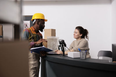 Young woman working in office