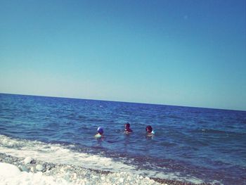 Scenic view of sea against blue sky