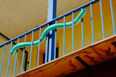 Close-up of stairs along railing