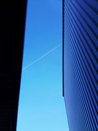 Low angle view of building against blue sky