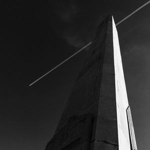 Low angle view of skyscraper against sky