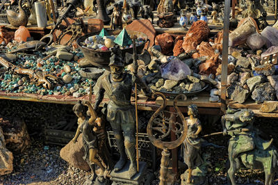 Statues for sale at market stall