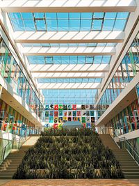 Low angle view of modern glass ceiling