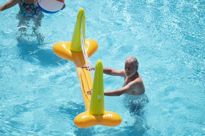 High angle view of people in swimming pool