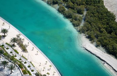 High angle view of swimming pool by sea