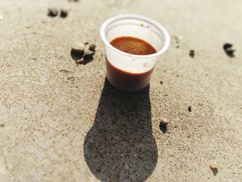 High angle view of coffee cup on table