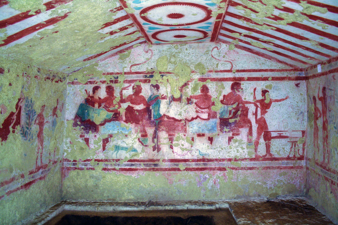 CLOSE-UP OF CARVING ON WALL WITH CEILING