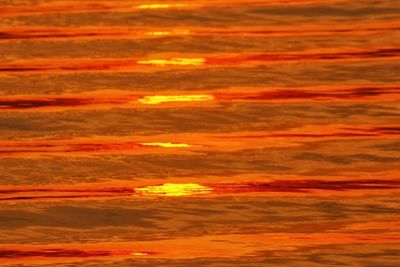 Scenic view of dramatic sky during sunset