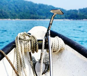 Cropped image of boat in lake