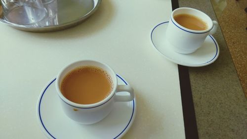 High angle view of coffee on table