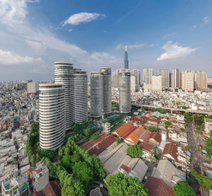 High angle view of buildings in city against sky